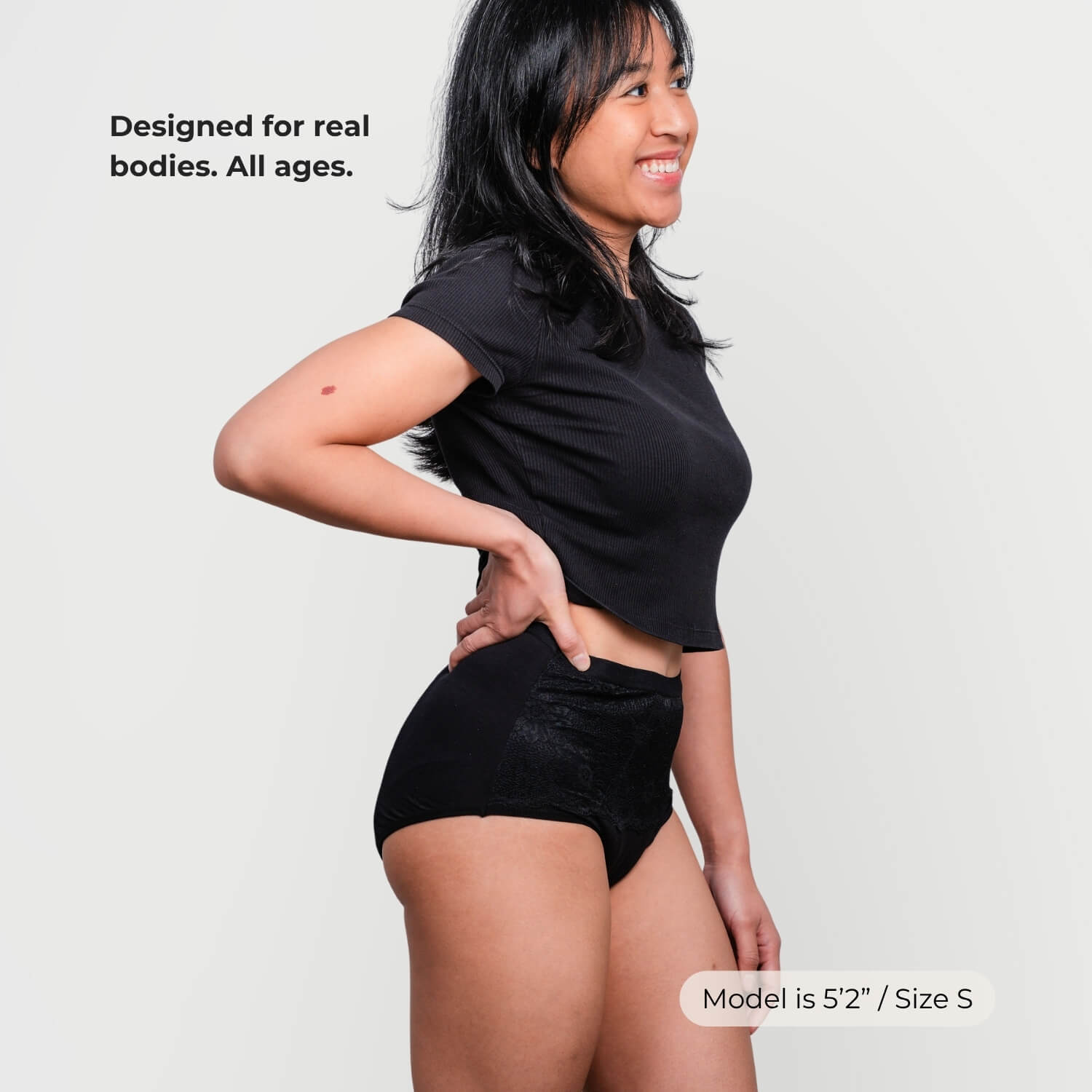 Side view of women's reusable incontinence underwear showing discreet profile under clothing